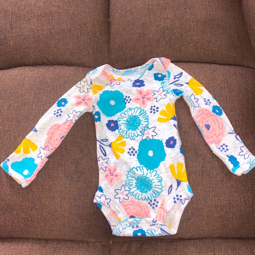 Flowered newborn bodysuit from Carter’s